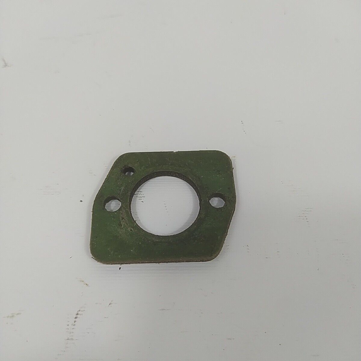 Ricambio FLANGIA COLLETTORE VITI CARBURATORE per motosega CASTOR CP 700 usato