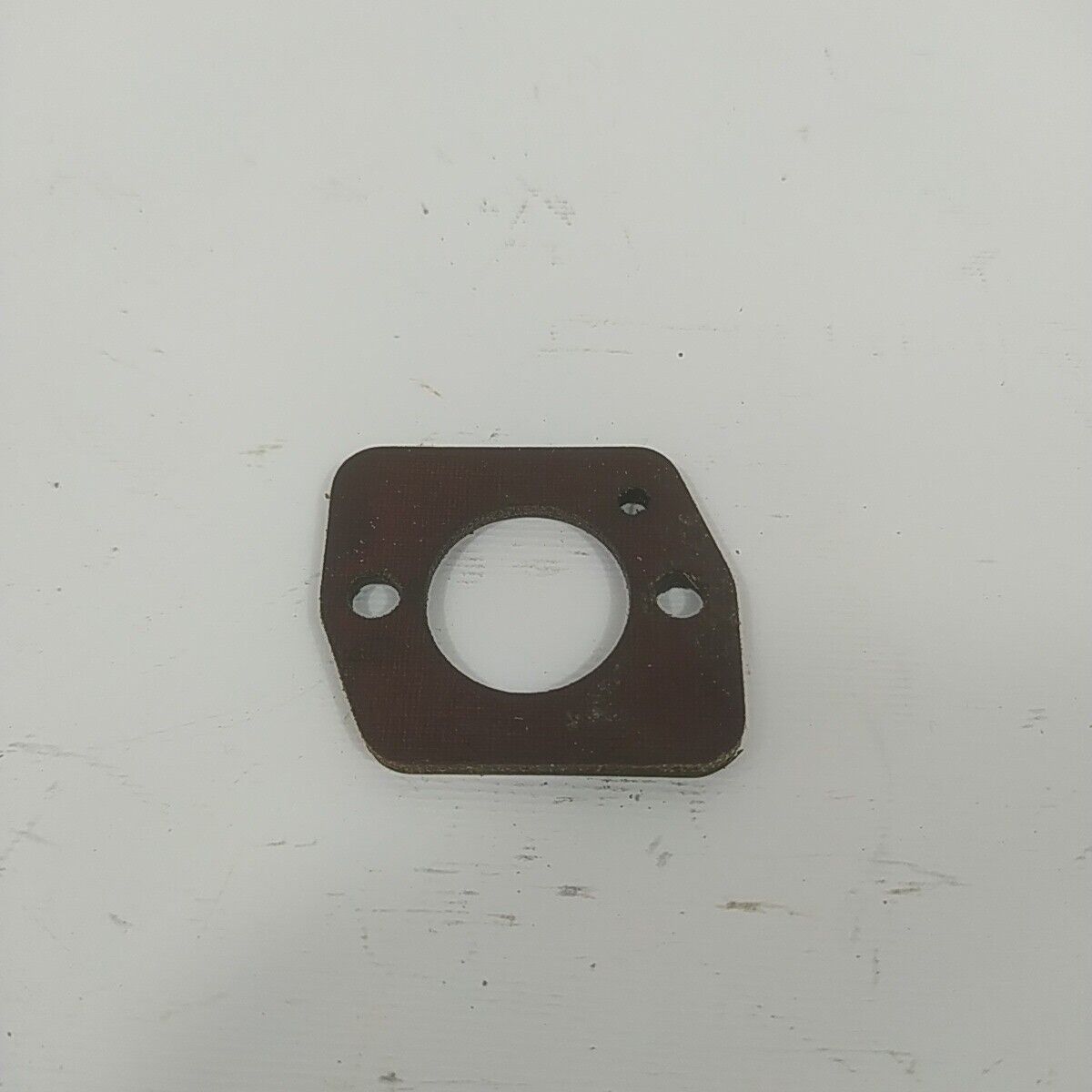 Ricambio FLANGIA COLLETTORE VITI CARBURATORE per motosega CASTOR CP 700 usato