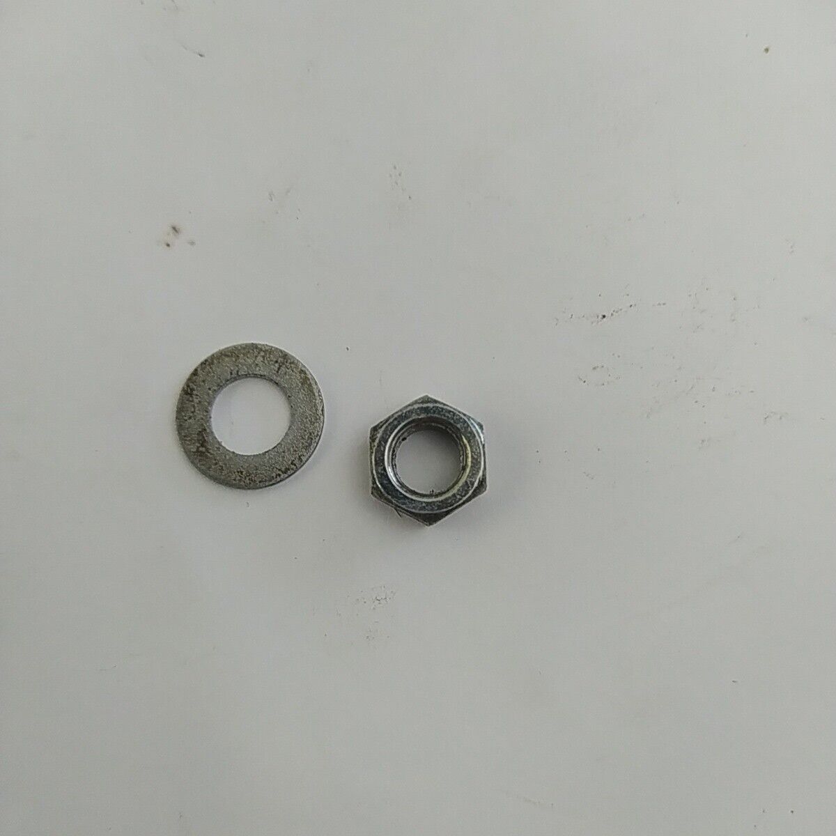 Ricambio DADO albero lato avviamento usato per decespugliatore KAWASAKI TD 40