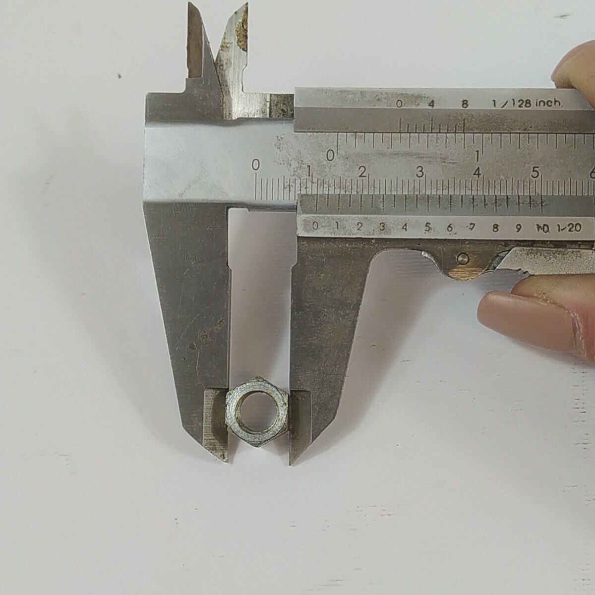 Ricambio DADO LATO VOLANO usato per decespugliatore OLEO MAC DYNAMAC EMAK