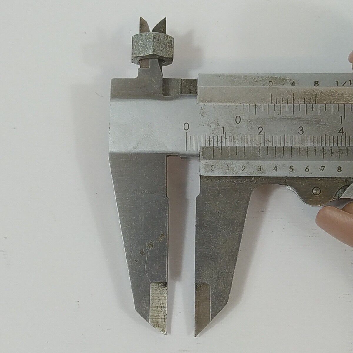 Ricambio DADO LATO VOLANO usato per decespugliatore OLEO MAC DYNAMAC EMAK