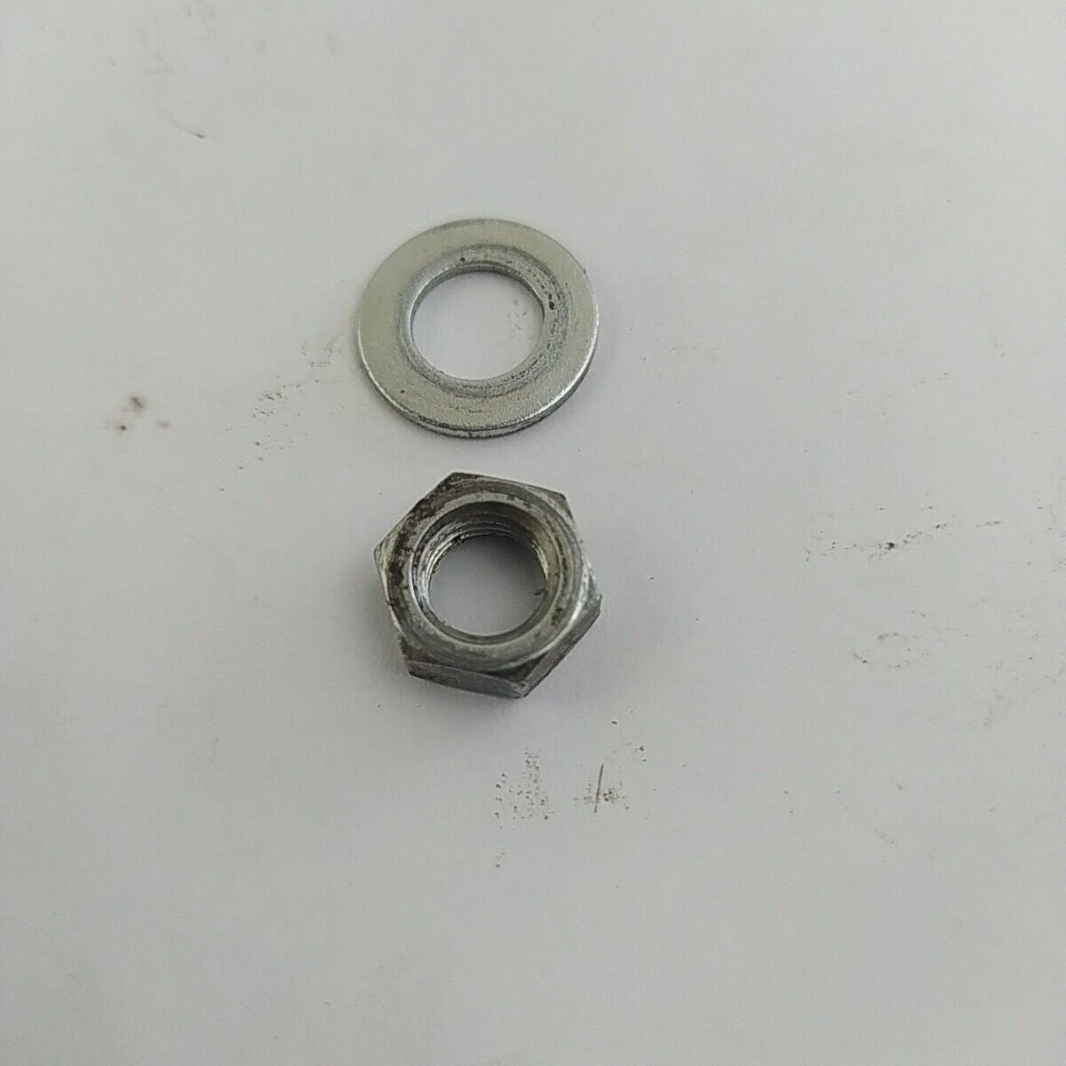 Ricambio DADO albero lato avviamento usato per decespugliatore KAWASAKI TD 40